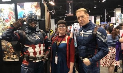 Jamie Hollier, center, is Captain Marvel at Denver’s comic convention.